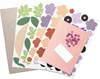 A flat lay of craft supplies for making flower wreaths. Produktbild-Vorschau