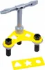 A toy tool set with a wrench, bolts, and a stencil. Produktbild-Vorschau