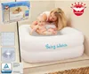 A mother is bathing her baby in an inflatable baby pool placed in a shower stall. Produktbild-Vorschau