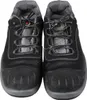 A pair of black work shoes with grey accents and laces, shown from the front. Produktbild-Vorschau