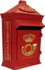 A red retro post box with gold accents, presented against a white background. Produktbild-Vorschau