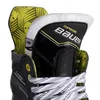Close-up view of the top of a black and yellow Bauer Supreme M30 ice hockey skate. Podgląd zdjęcia produktu