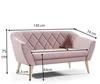 A pink velvet sofa with diamond quilting and wooden legs, shown with dimensions indicated by measurement lines and text. Anteprima dell’immagine prodotto