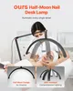A nail technician using a half-moon desk lamp on a client. Produktbild-Vorschau