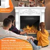 A family is sitting on the floor in front of a fireplace, enjoying the warmth. Produktbild-Vorschau