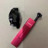 A black bicycle brake caliper and a red aluminum compression tool are placed on a light gray surface. Produktbild-Vorschau