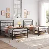 Two twin beds in a bedroom with decorative items and natural light. Produktbild-Vorschau