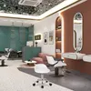 A modern salon interior with styling chairs, a reception desk, and decorative elements. Produktbild-Vorschau