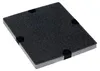 A square-shaped object with a textured dark gray surface and black circles on its corners sits on a white surface. Produktbild-Vorschau