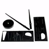 A collection of black clock parts, including hands, a central mechanism, and adhesive numbers, arranged on a white background. Produktbild-Vorschau