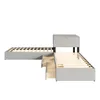 A modular bed frame with storage drawers and a built-in nightstand, shown against a white background. Podgląd zdjęcia produktu
