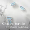 Razor blade refills are arranged on a marble-like surface with text overlay. Anteprima dell’immagine prodotto