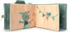 An open fabric photo album for children, showing two pages with illustrations of cartoon characters. Anteprima dell’immagine prodotto