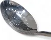 A close-up, angled view of a metal skimmer with a decorative pattern of holes and etched lines, set against a white background. Produktbild-Vorschau