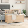 A bedroom scene with a bed and a wooden storage bench in the foreground. Podgląd zdjęcia produktu