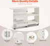 A white sewing table with various storage compartments and shelves, shown with close-up details of its features. Voir les images du produit