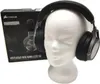 A pair of black Corsair Virtuoso RGB Wireless SE gaming headphones are displayed on a white mannequin head, with the product's packaging visible in the background. Produktbild-Vorschau