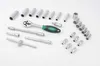 A collection of socket wrenches and accessories laid out on a white background. Produktbild-Vorschau