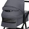 Close-up of a grey baby stroller bassinet with a mesh window. Produktbild-Vorschau