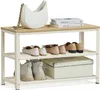A shoe bench with shoes and a handbag on it. Produktbild-Vorschau