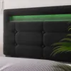 Close-up of a dark gray upholstered headboard with green LED lighting. Náhled obrázku produktu