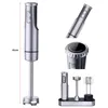 A product shot of a silver immersion blender and its accessories, displayed on a white background. Voir les images du produit