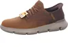 A single brown Skechers men's sneaker is shown against a white background. Voir les images du produit