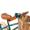 Close-up of a bicycle's handlebars, seat, and front basket. Produktbild-Vorschau