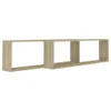 A long, narrow, light brown wooden shelf unit with three open compartments, mounted against a white background. Produktbild-Vorschau