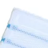 A close-up view of a white and blue mop pad. Podgląd zdjęcia produktu