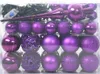 A set of purple Christmas ornaments and lights in a clear plastic box. Produktbild-Vorschau