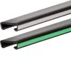 Two lengths of handrail profiles are shown against a white background. The top profile is gray and black, while the bottom profile is dark gray, black, and green. Anteprima dell’immagine prodotto