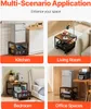 A collage of four images showing a rolling stand with storage shelves used in different rooms: a kitchen, a living room, a bedroom, and an office space. The text 'Multi-Scenario Application' and 'Enhance your space' is present at the top. Voir les images du produit