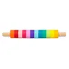 A colorful rolling pin with segments of different colors on a white background. Podgląd zdjęcia produktu