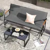 An outdoor patio scene with a glider bench, coffee table, and rug. Podgląd zdjęcia produktu