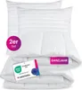 A set of white bedding products, including pillows and a comforter, stacked on top of each other. Produktbild-Vorschau