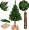 A Christmas tree with its accessories laid out on a white background. Voir les images du produit