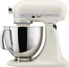 A cream-colored KitchenAid Artisan stand mixer is shown from a side angle against a white background. Produktbild-Vorschau