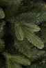A close-up view of artificial Christmas tree branches. Voir les images du produit