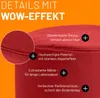 Close-up marketing image of a red pouf, highlighting its features with text overlays and a magnified detail of the fabric. Produktbild-Vorschau