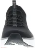 A close-up, front-facing view of a black Skechers sneaker. Náhled obrázku produktu