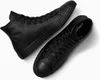 A pair of black leather Converse Chuck Taylor high-top sneakers are shown from a top-down perspective against a white background. Produktbild-Vorschau