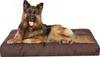 A German Shepherd dog lying on a brown dog bed. Náhled obrázku produktu