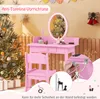 A pink children's vanity set with a chair, decorated for Christmas with a tree and ornaments. The image includes a close-up of an anti-tipping device. Náhľad obrázku produktu