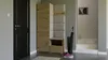 Hallway with a wardrobe set, door, and stairs. Náhled obrázku produktu