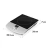 A silver and black induction cooktop with dimensions indicated. Produktbild-Vorschau