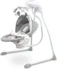 A white baby swing with gray fabric and a mobile hanging above the seat. Náhľad obrázku produktu