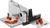 A food slicer with strawberries, some whole and some sliced, on a white background. Produktbild-Vorschau