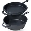 Two black cast iron cooking pans are stacked on a white background. Náhled obrázku produktu