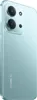A close-up, angled view of the back of a mint green smartphone. Náhled obrázku produktu